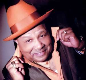 Ali-with-Hat-e1589153727323.jpg